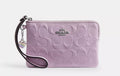 Corner Zip Wristlet In Signature Leather With Heart Charm purple