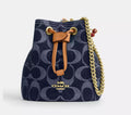 wristlet bucket  denim coach cherry