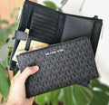 Cartera cellphone Jet Set Travel negro monogram