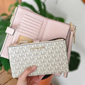 Cartera cellphone Jet Set Travel rosa