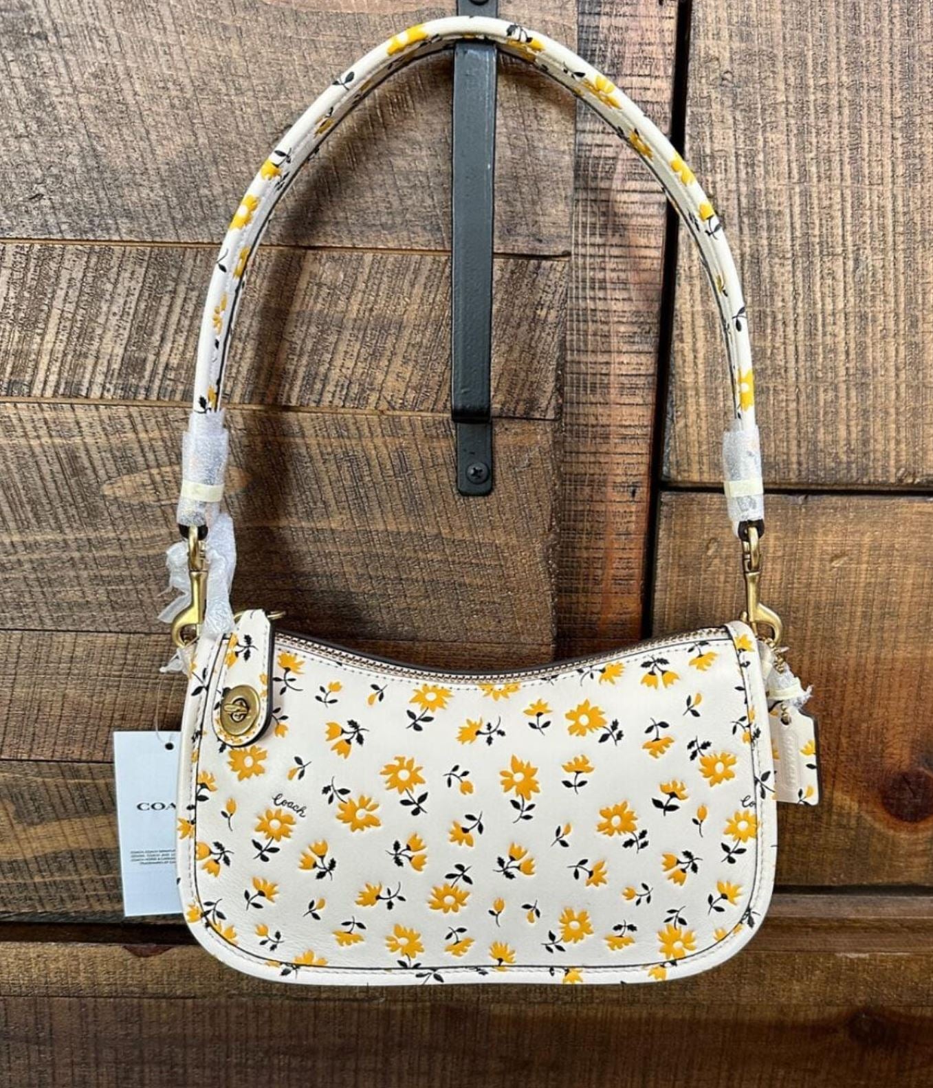Coach boutique Swinger 20 floral